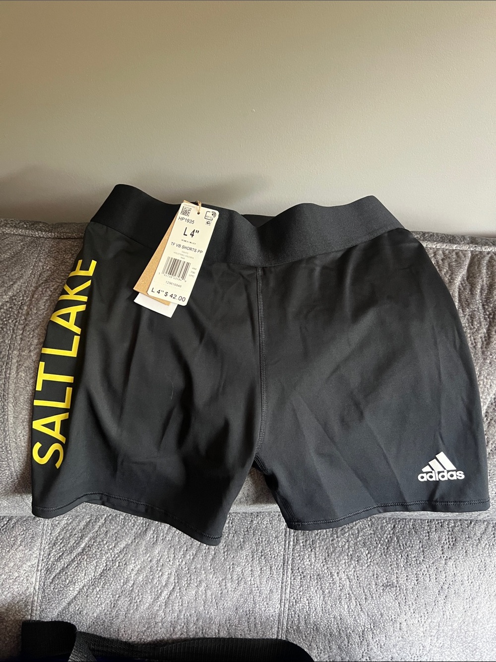 adidas Women's Black Athletic Shorts with Yellow 'Salt Lake' Side Print